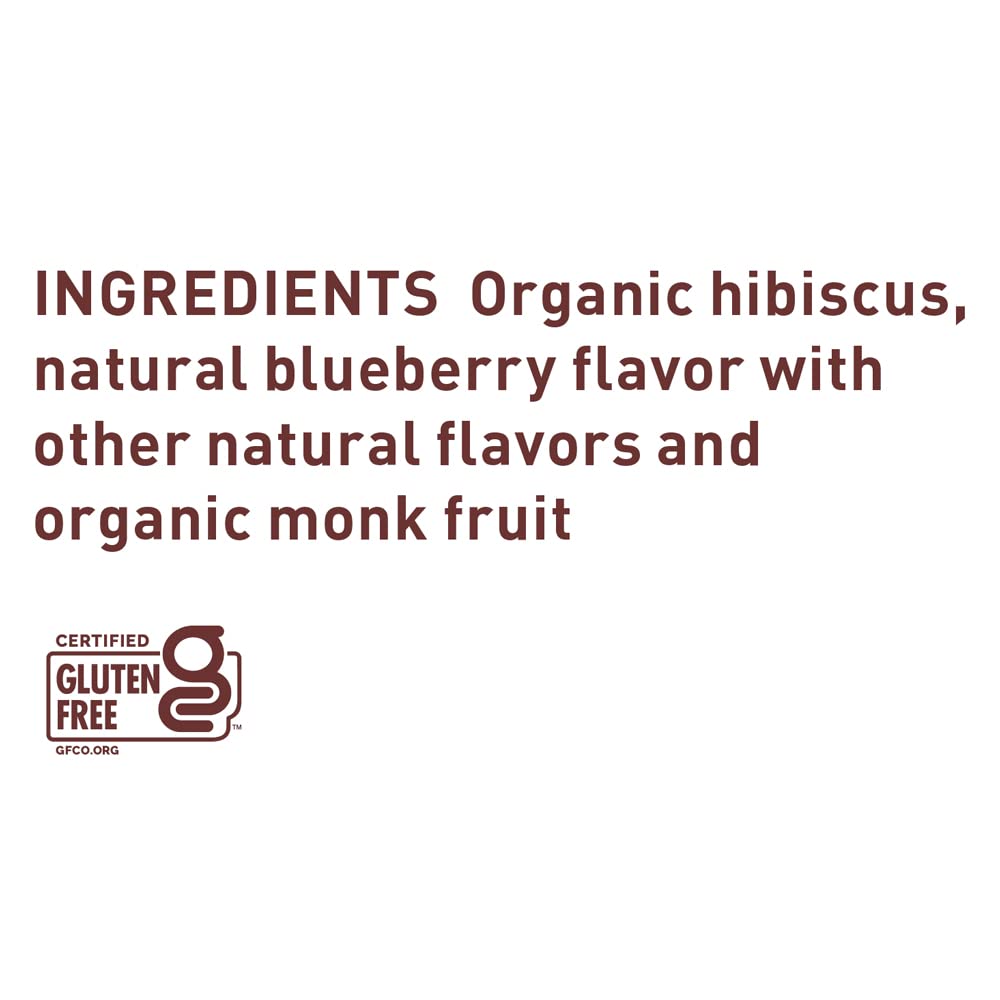 A glass of The Republic of Tea Blueberry Hibiscus Iced Tea served over ice.