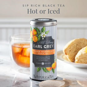 A brewed cup with scones highlights a comforting afternoon tea moment from The Republic of Tea.
