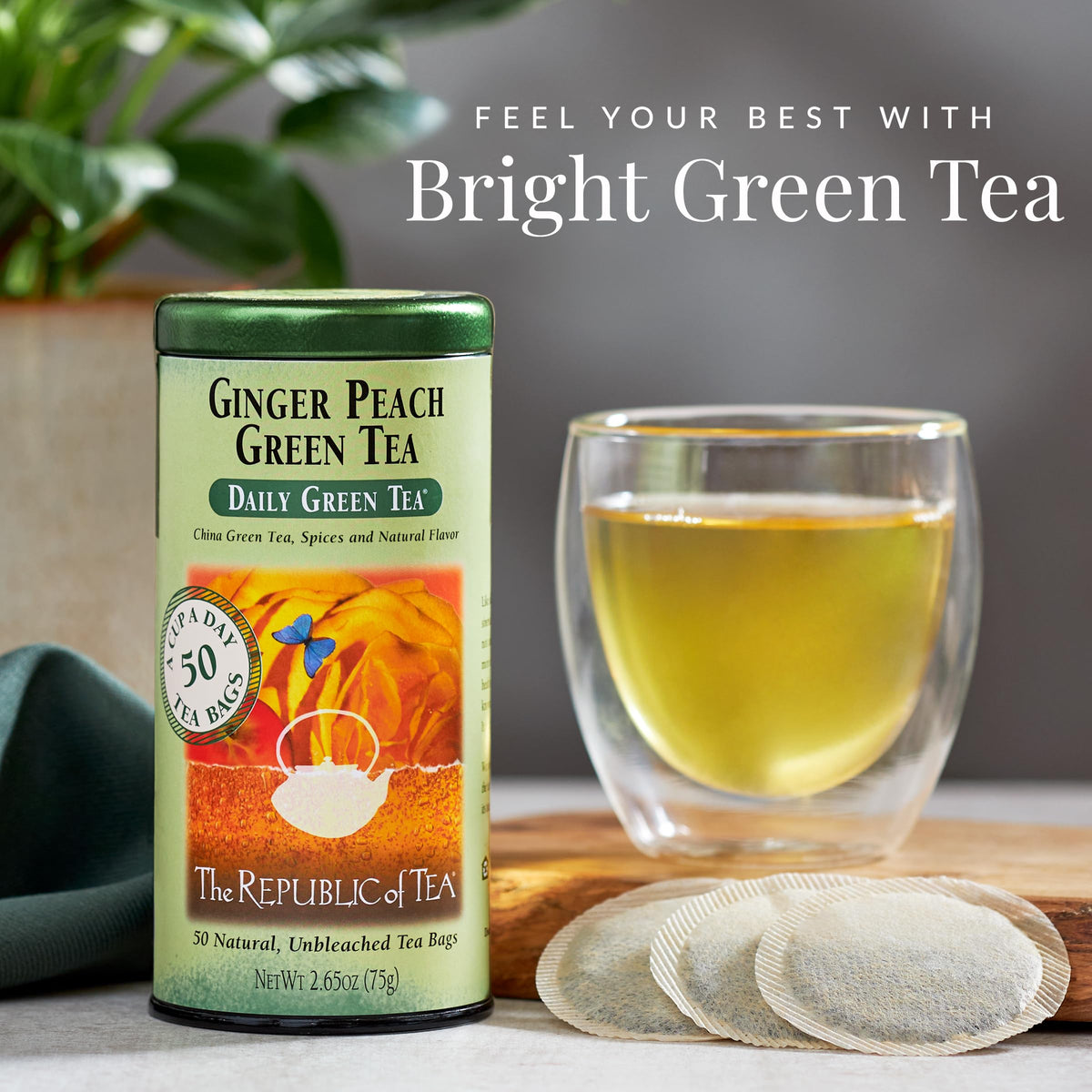 The Republic of Tea Ginger Peach Green Tea tin side showing ingredients and caffeine details