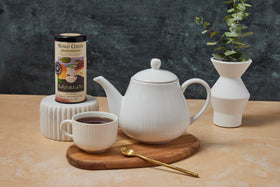 The Republic of Tea Mango Ceylon Black Tea bags in tin offer easy daily brewing.
