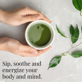 The Republic of Tea matcha whisk in action signaling ceremonial preparation.