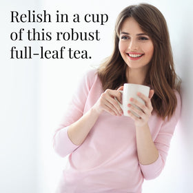 Organic Assam loose tea in a scoop, ideal for rich, multiple cups.