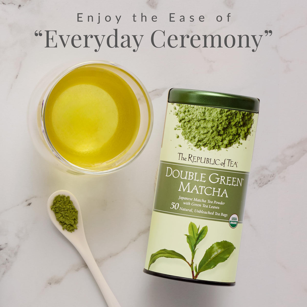 The Republic of Tea Organic Double Green Matcha bags steeping in hot water for a smooth cup.