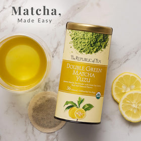 The Republic of Tea organic green tea leaves, showcasing quality ingredients for a balanced cup.