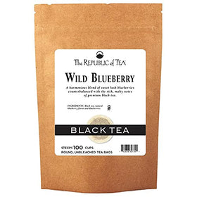The Republic of Tea Wild Blueberry Tea box on kitchen shelf, premium flavor