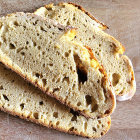 The Sourdough Source bread slices showing crusty loaves with einkorn flavor