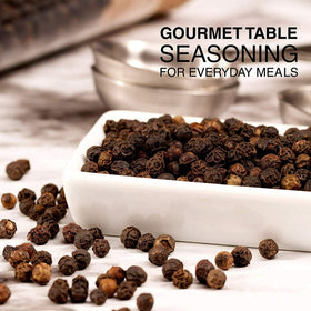 Beef and pork rub application using The Spice Lab Tellicherry peppercorns.