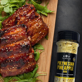 The Spice Lab Brown Sugar Chili Rub bottle delivers bold sweet heat on ribs.