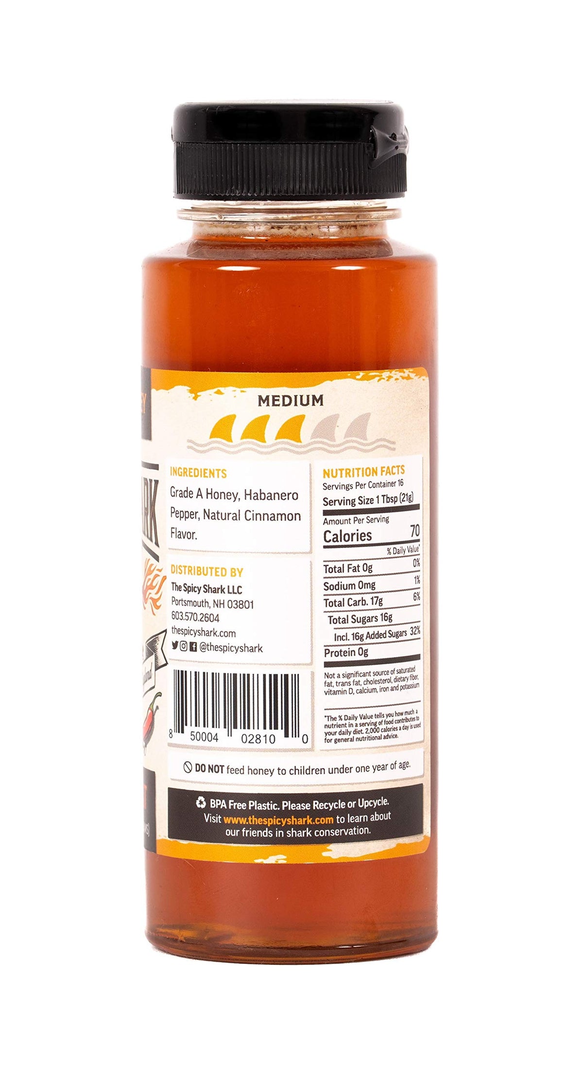 Close-up of The Spicy Shark Hot Honey label highlighting ethical ingredients.