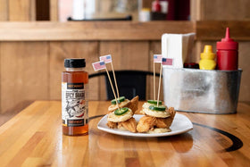 The Spicy Shark Hot Honey over pancakes suggests breakfast drizzle with a kick.