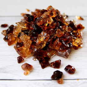 The Sugar Lab Belgian Brown Rock Sugar in a cup elevates tea flavor.