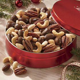 The Swiss Colony Premium Nut Assortment chocolate-covered cashews offer sweet, creamy indulgence.