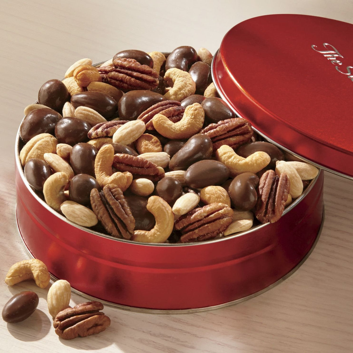 The Swiss Colony Premium Nut Assortment chocolate-covered pecans offer rich flavor.