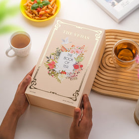 The Vedas Book of Tea gift box displaying premium herbal blends.