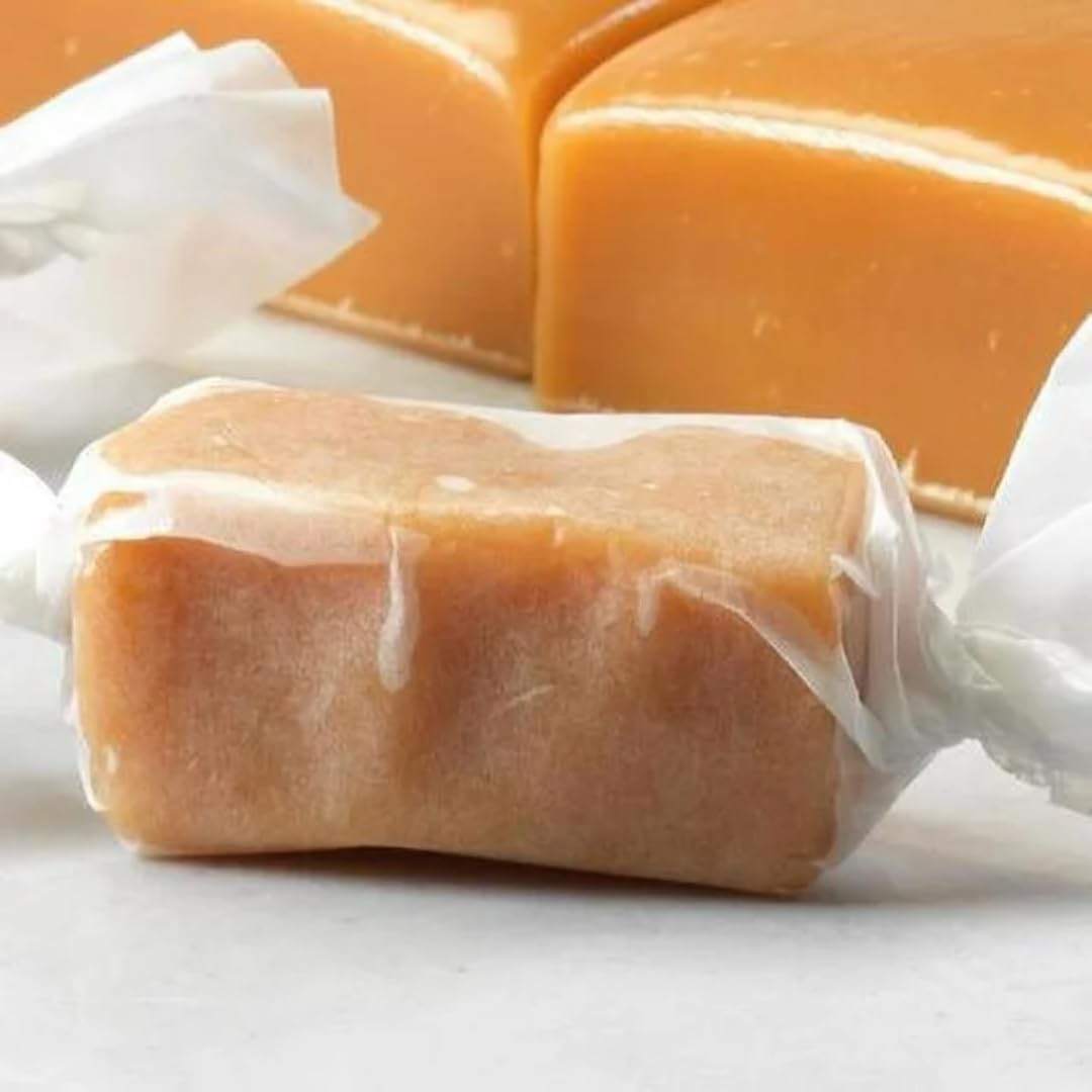 TheCandyCo caramels golden color close-up, melt-in-mouth texture for desserts.