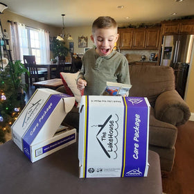 The LakeHouse shipping-ready snack box, sturdy packaging preserves freshness.