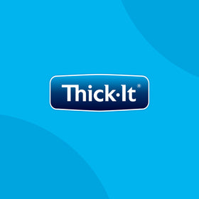 Spoonful of Thick-It in a shake showing quick, easy mixing