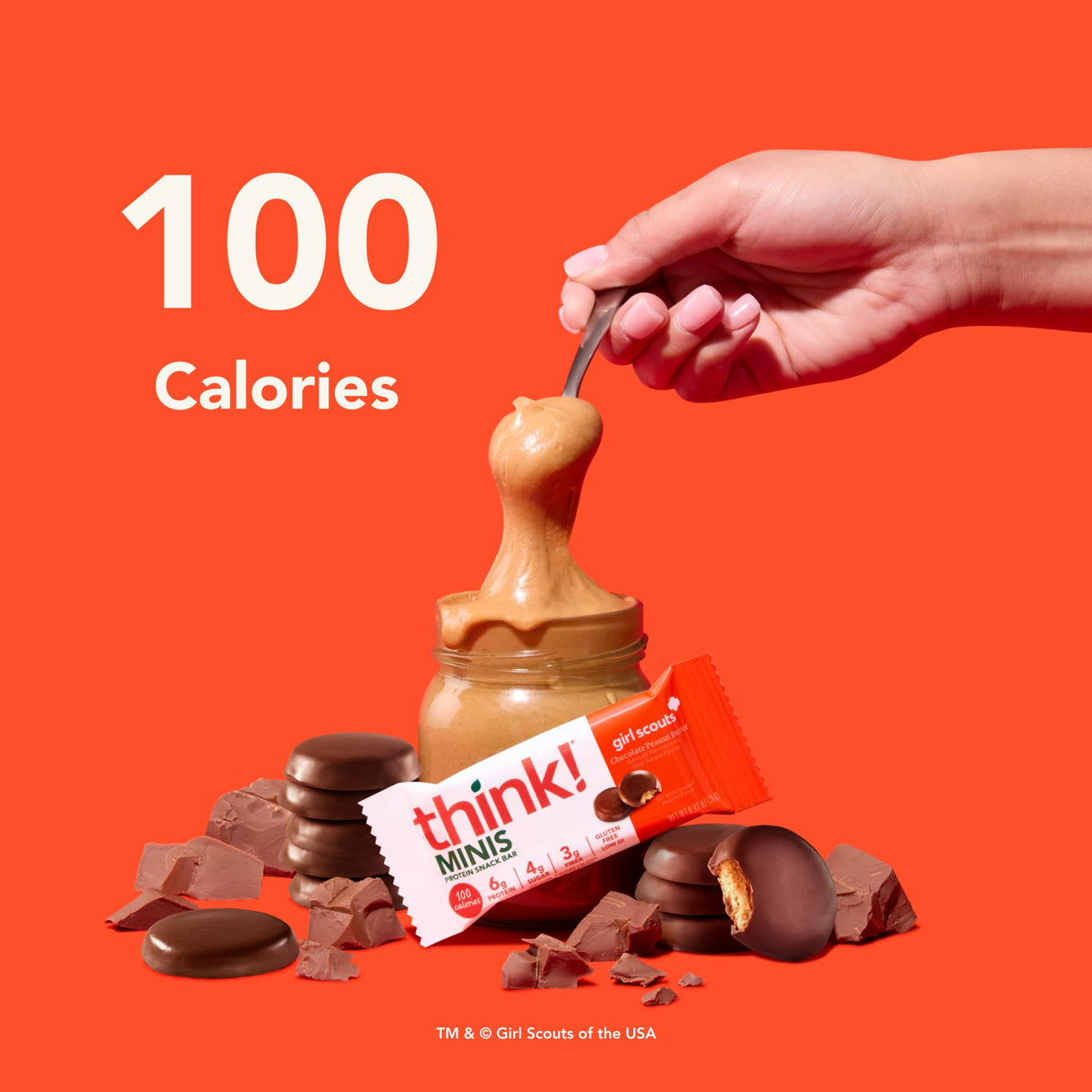 think! Minis chocolate peanut butter bar in hand, ideal for a quick protein-rich snack.