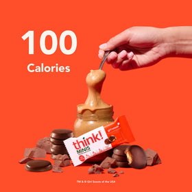 think! Minis chocolate peanut butter bar in hand, ideal for a quick protein-rich snack.