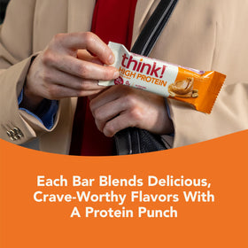 Think! Creamy Peanut Butter Bar cross-section showing creamy texture and chocolate coating.