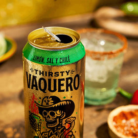 Thirsty Vaquero glass pour showing sparkling beverage moment
