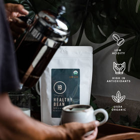 Healthy Bean Thrive ground-coffee product shot highlighting smooth, rich flavor.