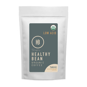 Thompson's Healthy Bean Thrive packshot shows organic coffee with low acidity for sensitive stomachs.