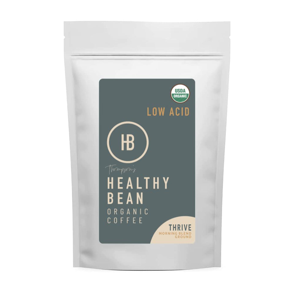 Thompson's Healthy Bean Thrive packshot shows organic coffee with low acidity for sensitive stomachs.