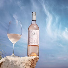 Thomson and Scott Noughty Provence Rosé pouring, showing dealcoholized finish on the tongue.