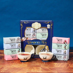 Thoughtfully Alice’s Adventures Illustrated teacups, storytelling charm at tea time.