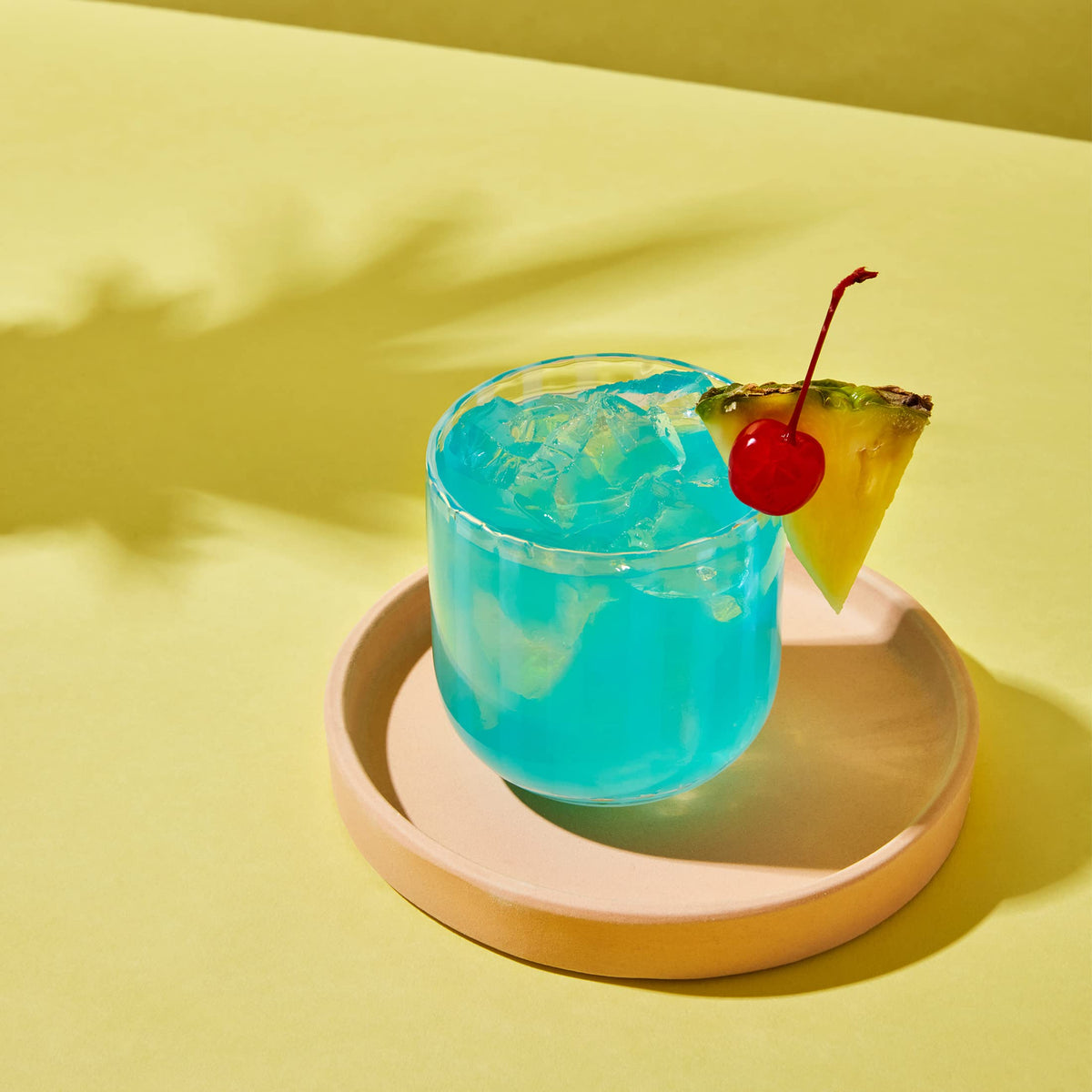 Thoughtfully Lemon Drop mixer bottle highlighting zesty, dairy-free flavor