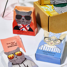 Thoughtfully Gourmet Tea cartons feature cat art representing each flavor.