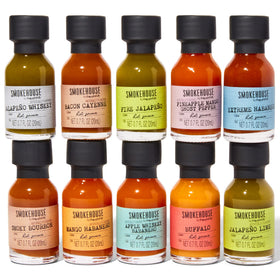 Thoughtfully Smokehouse sampler glass bottles arranged for tasting and kitchen experiments