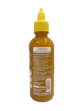 Three Mountains Yellow Sriracha bottle side view with squeezable cap for ease