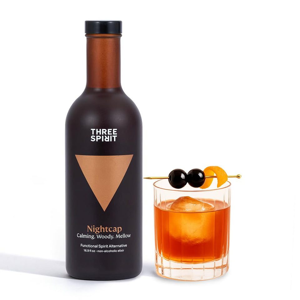Three Spirit Nightcap bottle on ice for an alcohol-free relaxing evening ritual.
