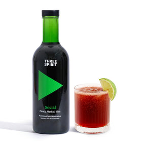 Three Spirit Social Elixir bottle on a table, ready for a social moment without alcohol