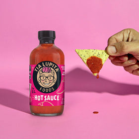 Close-up of Tia Lupita Chipotle Hot Sauce bottle showing smoky heat