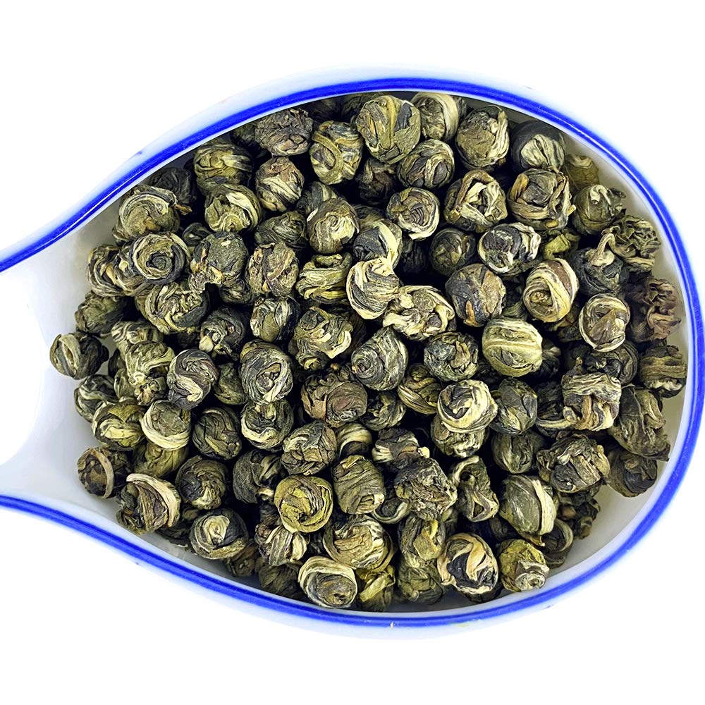 Tian Hu Shan Jasmine Dragon Pearls brewed liquor with bright jade infusion.