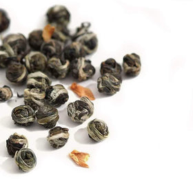 Tian Hu Shan Jasmine Dragon Pearls steaming action releasing floral notes.