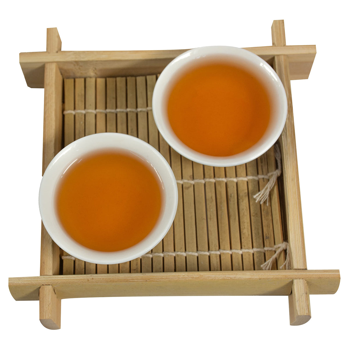 Tian Hu Shan Puerh tea in the cup releases a rich aroma and deep color.