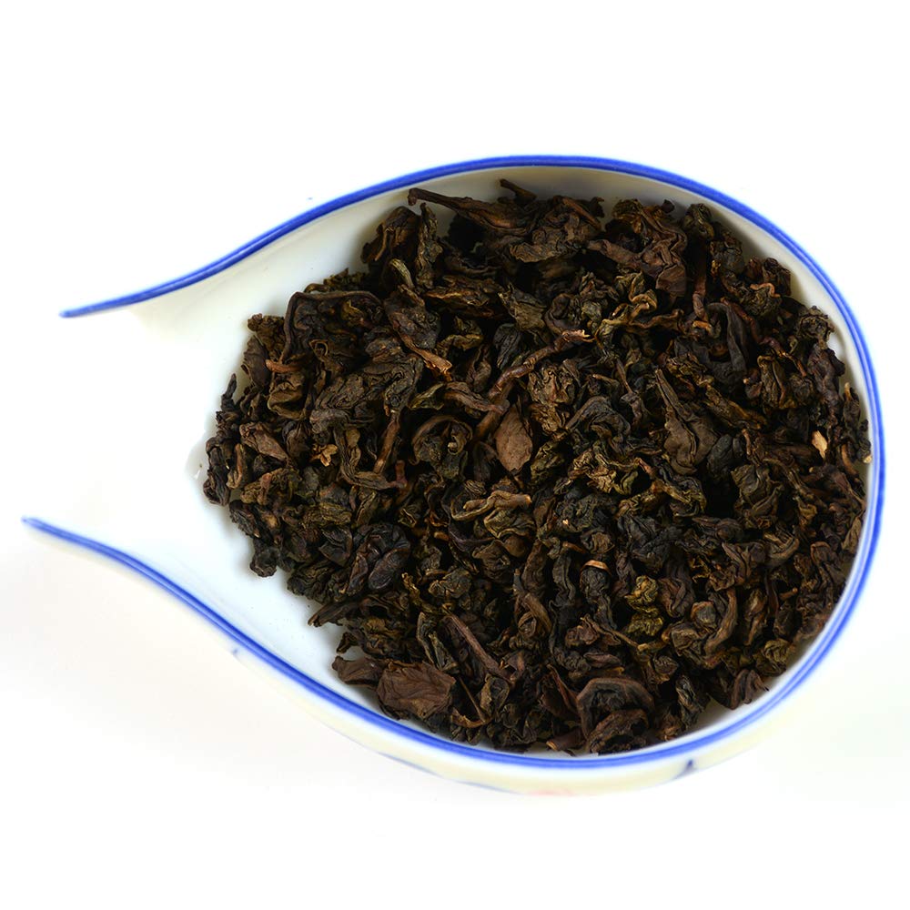 Tian Hu Shan tea garden soil texture highlights rich minerals fueling quality.