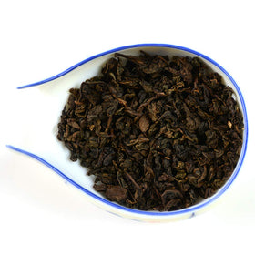 Tian Hu Shan tea garden soil texture highlights rich minerals fueling quality.
