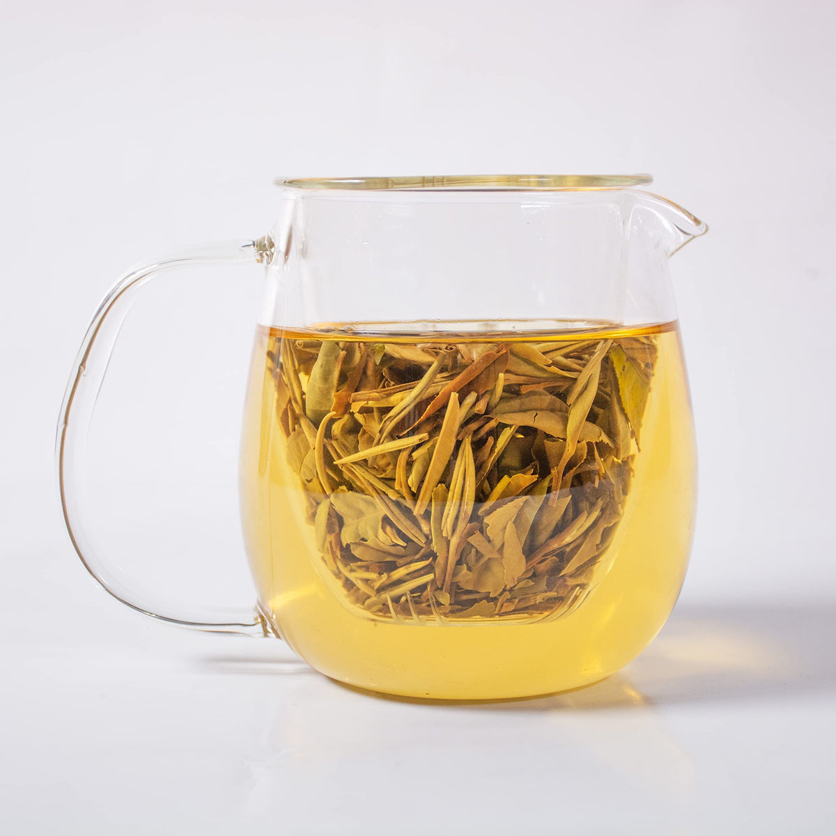 Tian Hu Shan White Tea appearance in ceramic cup invites a soothing ritual.