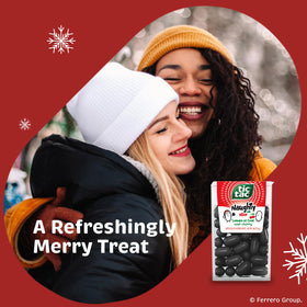 Tic Tac Naughty or Nice Lumps of Coal Sour Cherry in a holiday scene, gifting moment.
