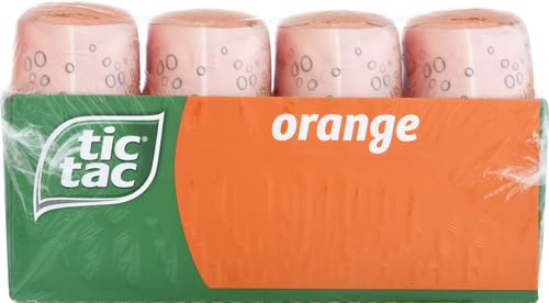 Tic Tac Orange mints pouring from a bottle for quick refresh