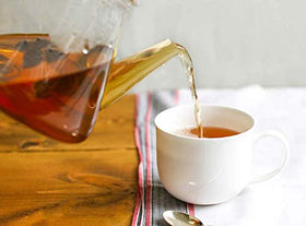 Tick Tock Teas Rooibos Earl Grey iced tea in a glass.