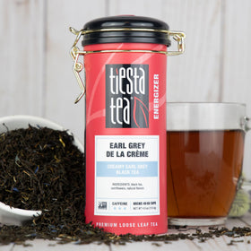 Tiesta Tea Creamy Earl Grey loose leaf in cup with steam.