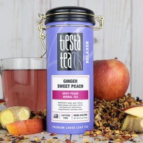 Tiesta Tea Ginger Sweet Peach tin side highlights premium packaging for lasting freshness.