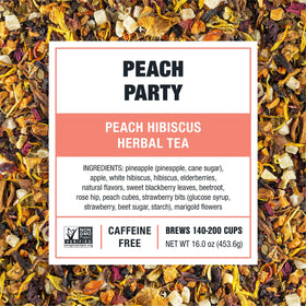 Tiesta Tea Peach Party hibiscus blend blooming in a cup for vibrant flavor.