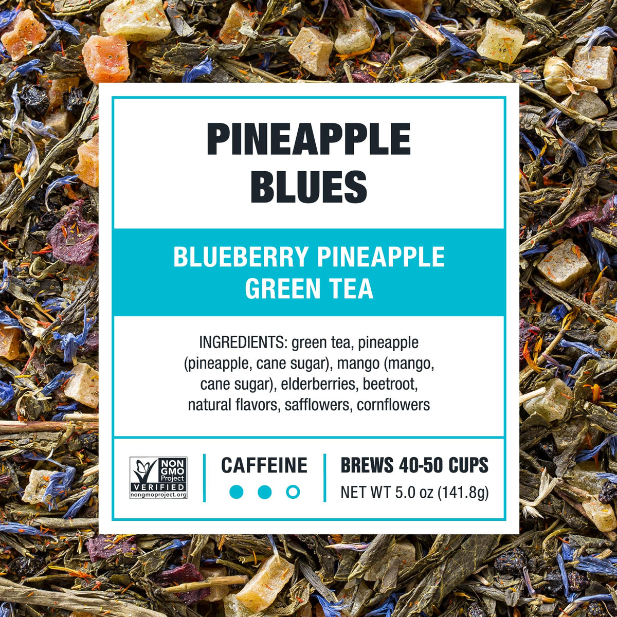 Pineapple Blues brew in a glass with steam ready to enjoy hot or iced